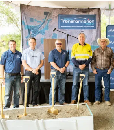 men standing together with gold shovels, breaking ground on the digital transformation project in Elko, Nevada.